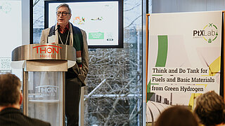 Dr Harry Lehmann welcomes guests to the panel discussion in Brussels with a speech.