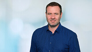 Portraitfoto von Oliver Ziegler