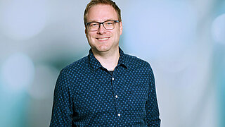 Portraitfoto von Christopher Kupke