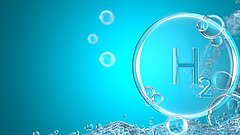 Several gas bubbles against a light blue background. One gas bubble is labelled "H2".